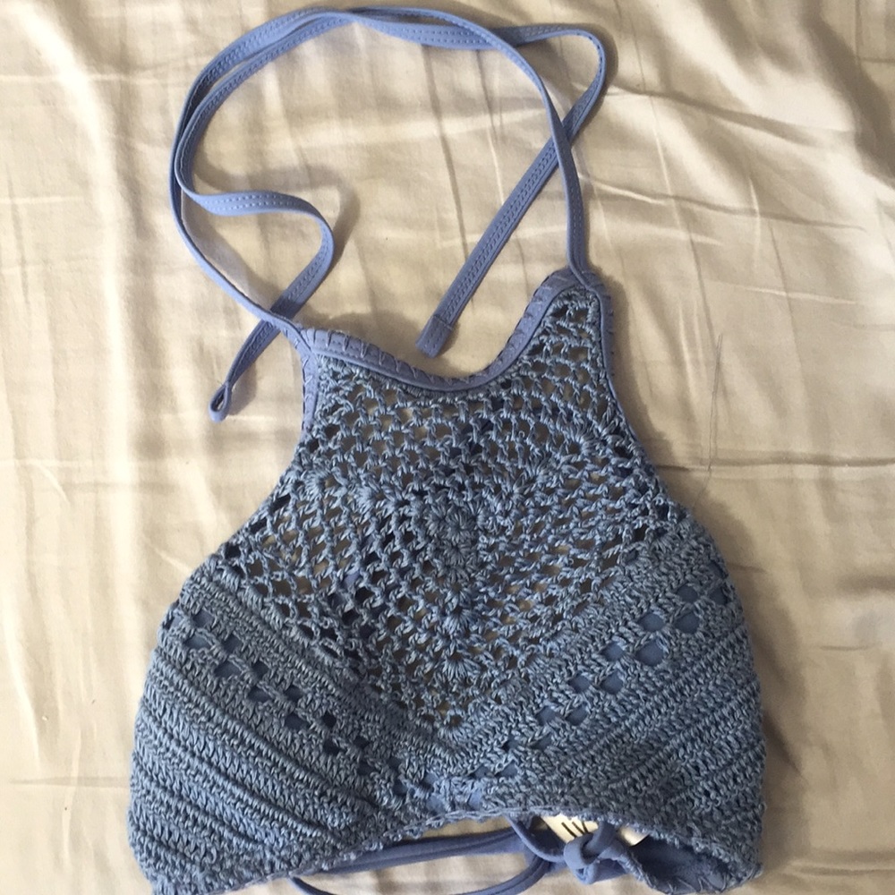 I am selling this blue crochet bathing suit.